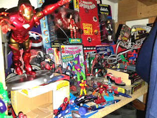Spider-Man Shelf Full of Toys and Accessories